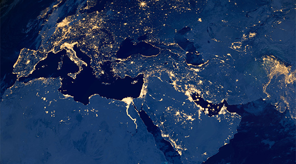view of the Mediterranean region at night showcasing city lights and geographical features highlighting two continents Europe and Asia