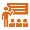 person presenting in front of a group in a training session with a focus on effective communication techniques and learning strategies 2 classroom 2 engagement